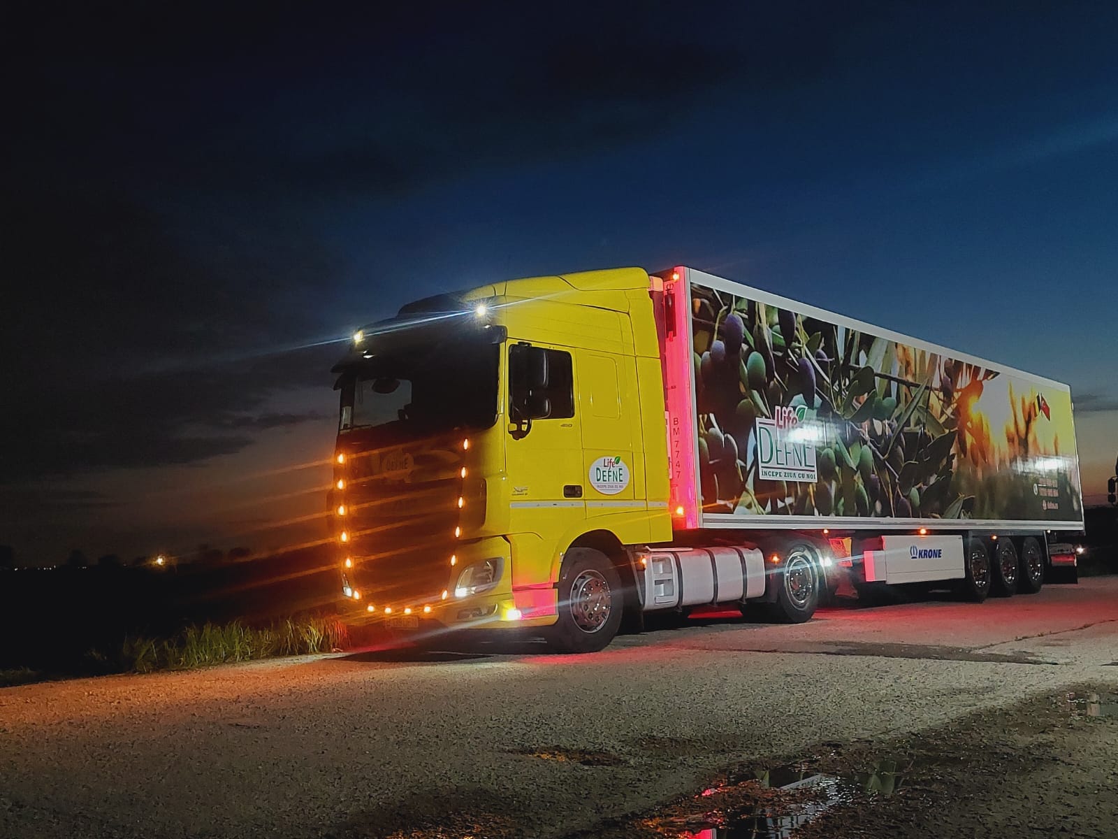 Defne Selos lorry with a Life Defne trailer, photographed in the evening